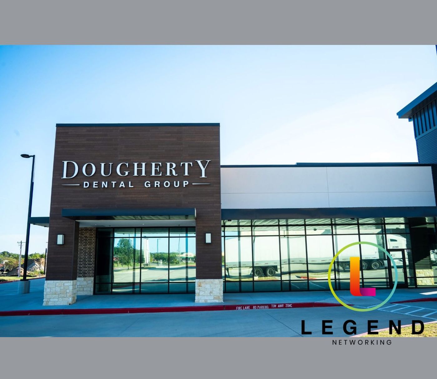 Storefront and Dougherty Dental Group sign on the new office in College Station, TX