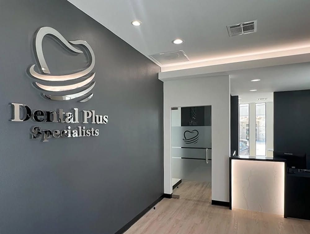 Dental Plus Specialists reception and practice signage.