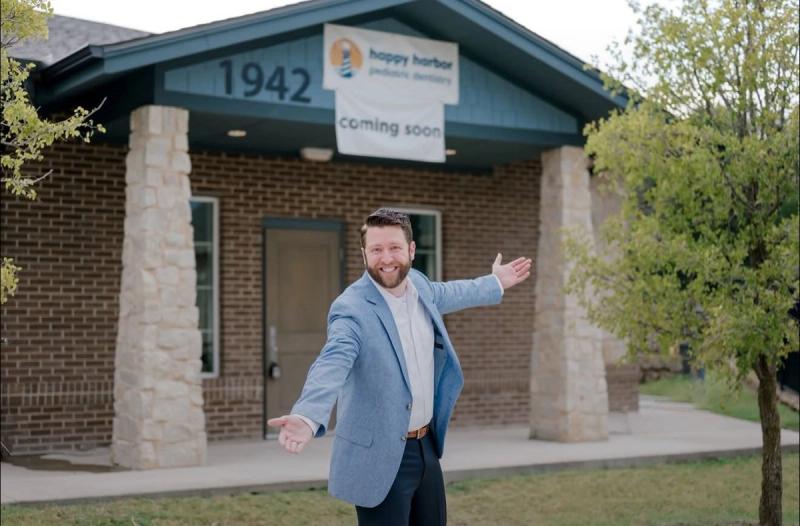 Exterior of Happy Harbor Pediatric Dentistry in Rockwall with a coming soon banner