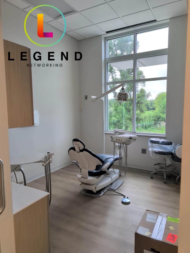 Newly installed dental chair in a bright treatment room with large window at Prestige Dental Care, South Lyon, MI