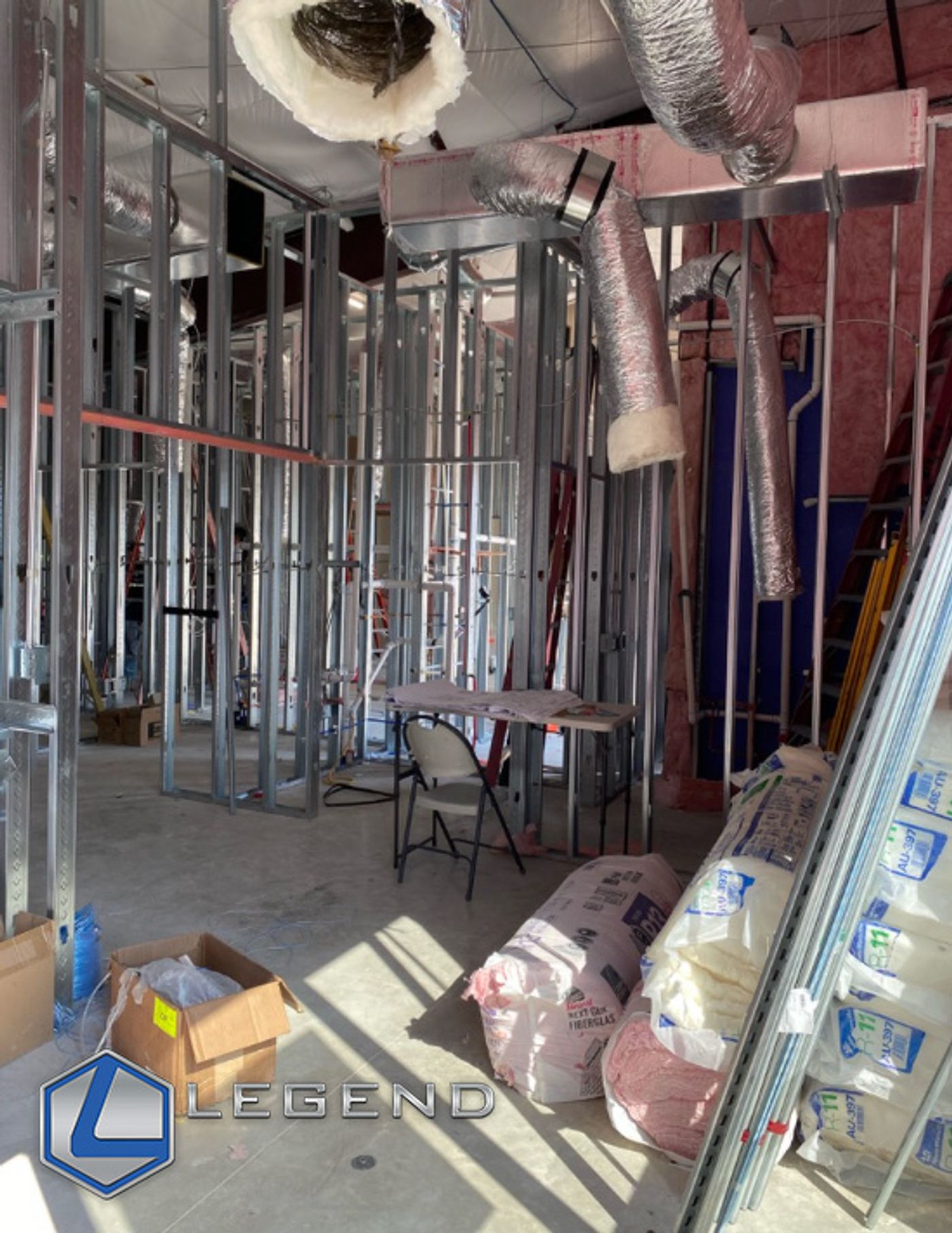 Framed interior walls and ductwork during the buildout of Top Star Prosthodontics in Georgetown, TX