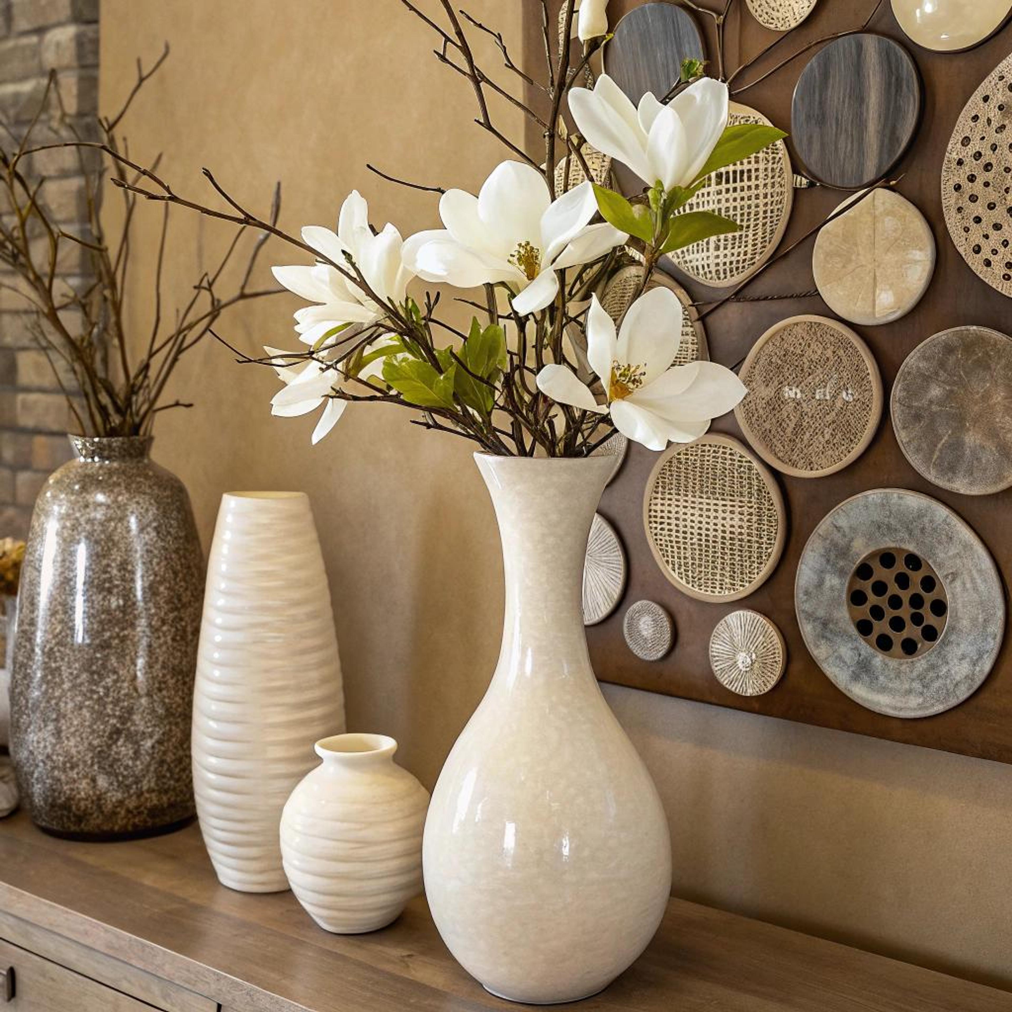 Gelaagde vazen bij terracotta