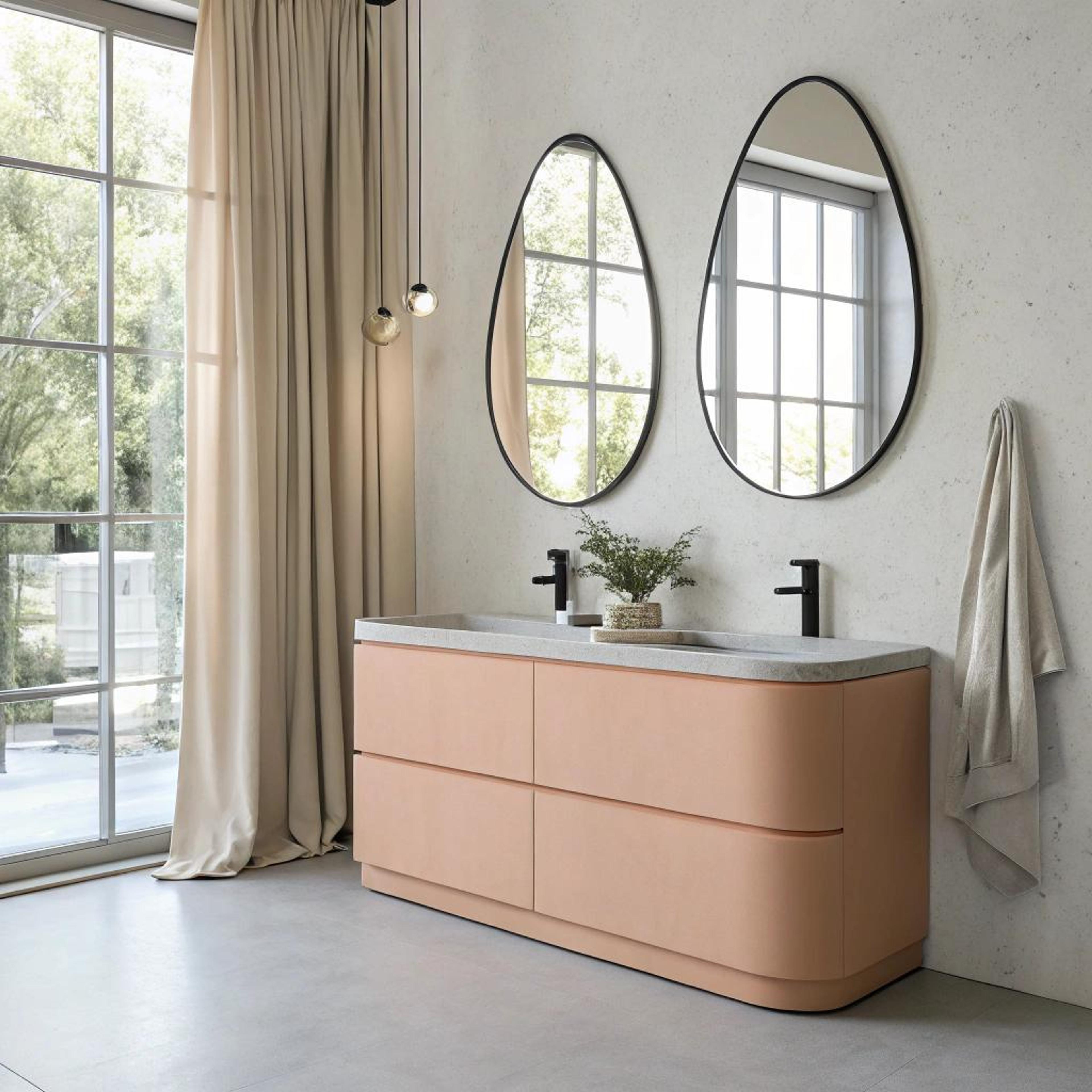 Ovale spiegels boven wasmeubel