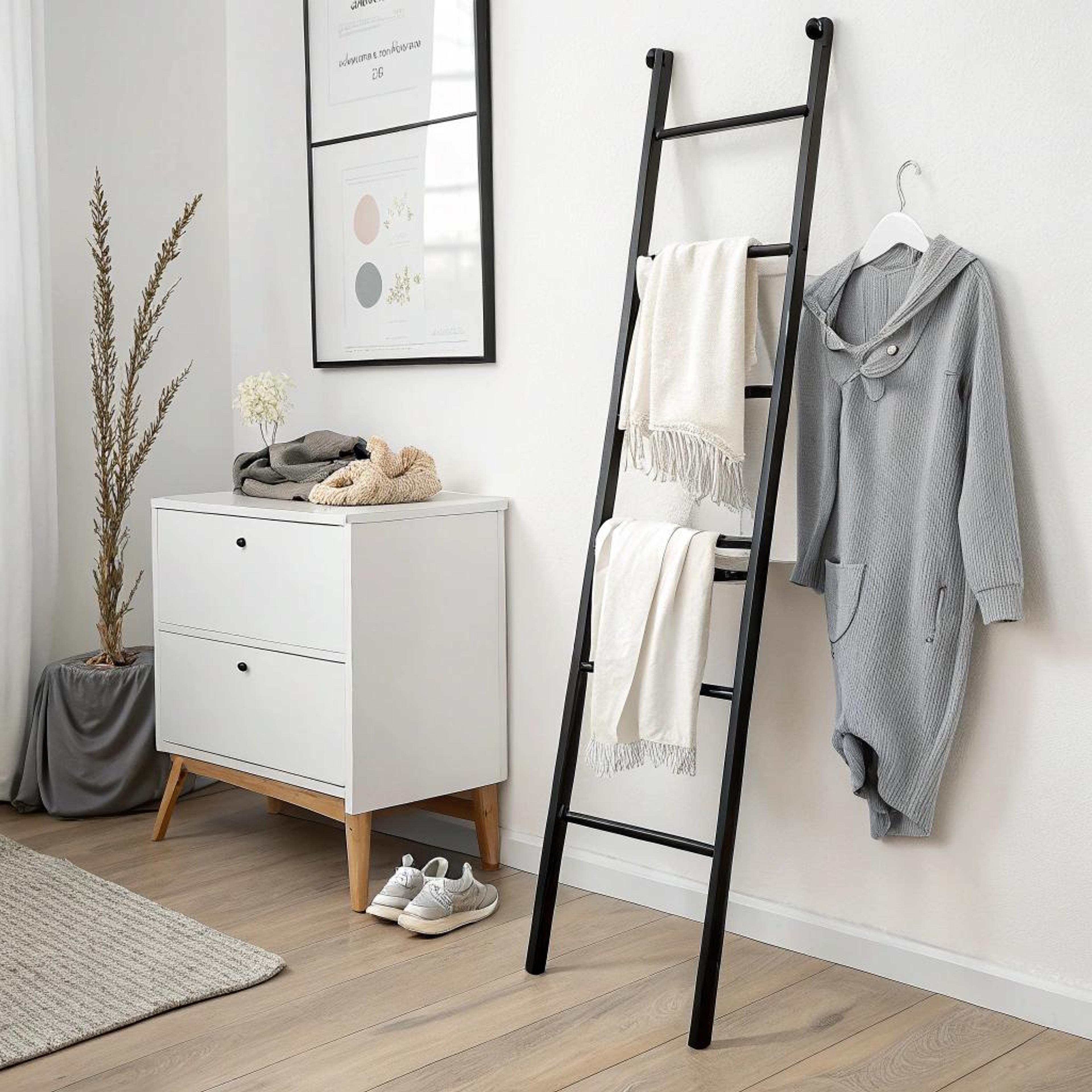 Zachte tinten rond handdoek ladder