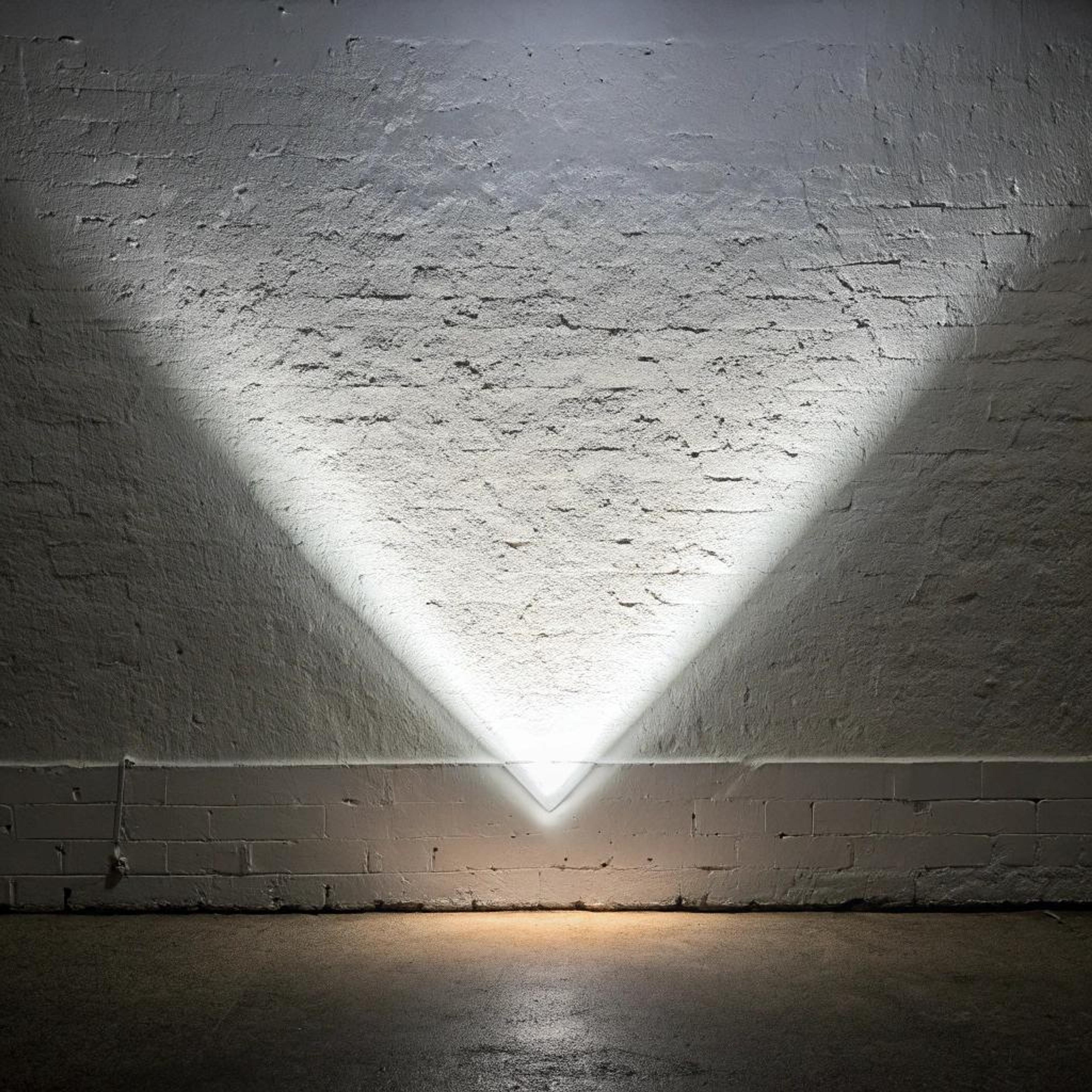 Lichtpatronen op bakstenen wand