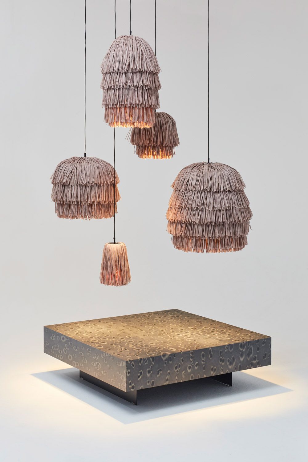 five lamps above a table
