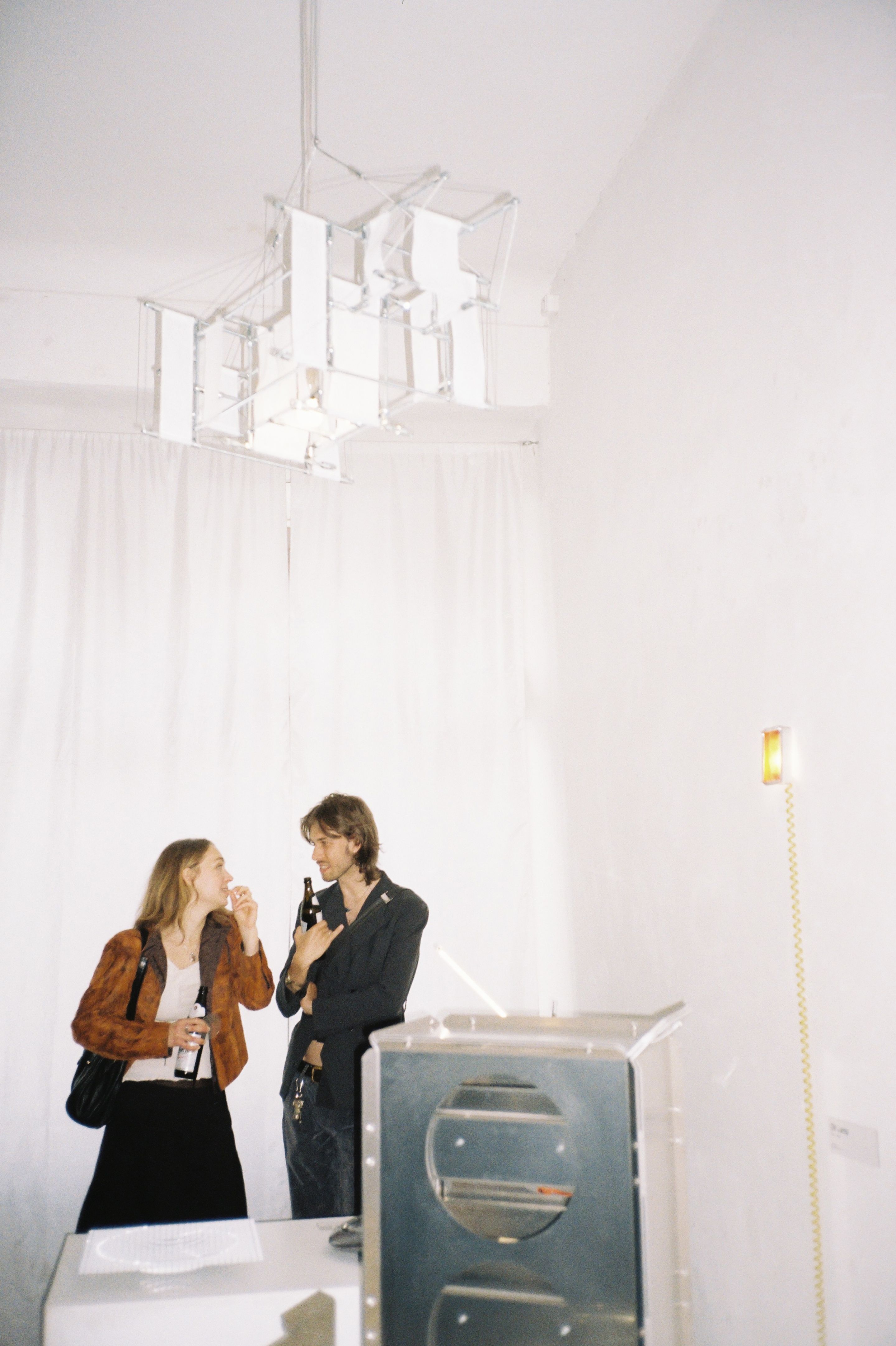 Two women in an exhibition