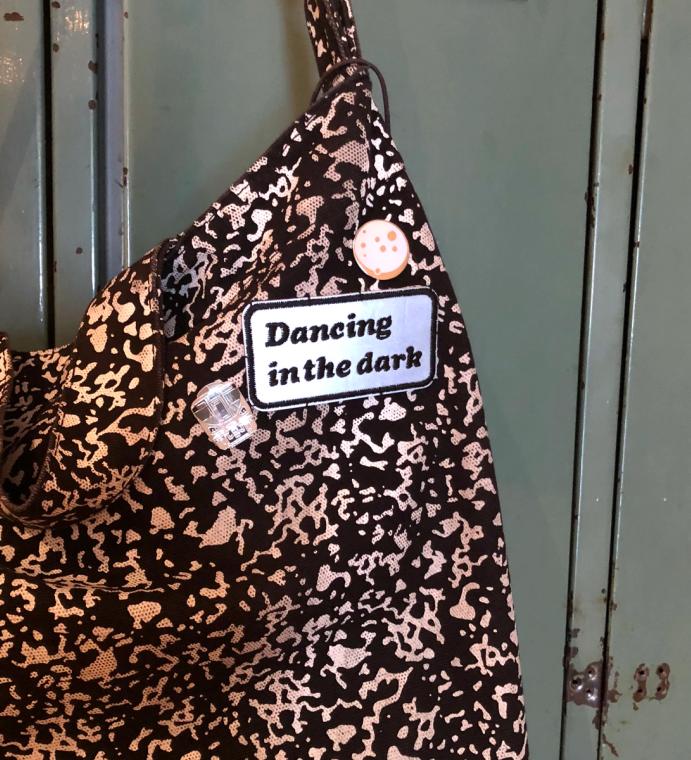 Dancing in the Dark patch on a bag