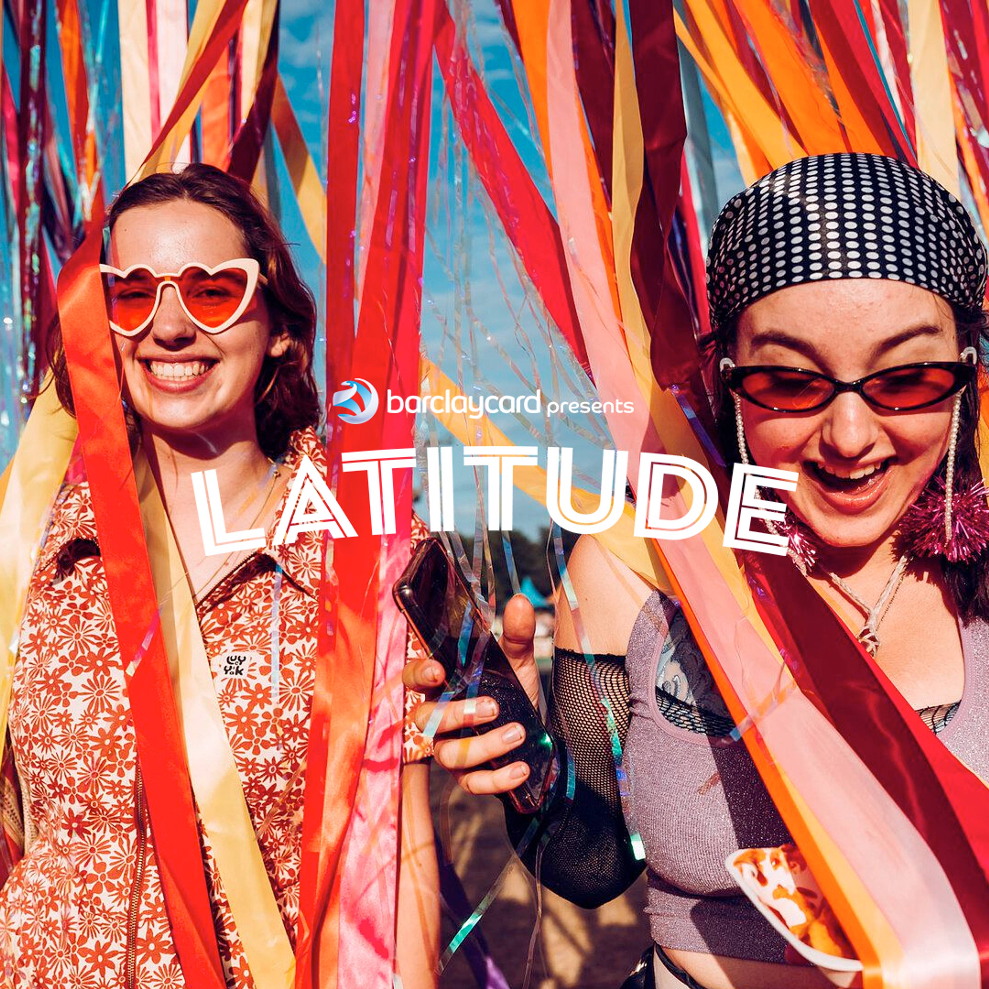 2 girls walking through colourful streamers behind the Latitude 2023 logo