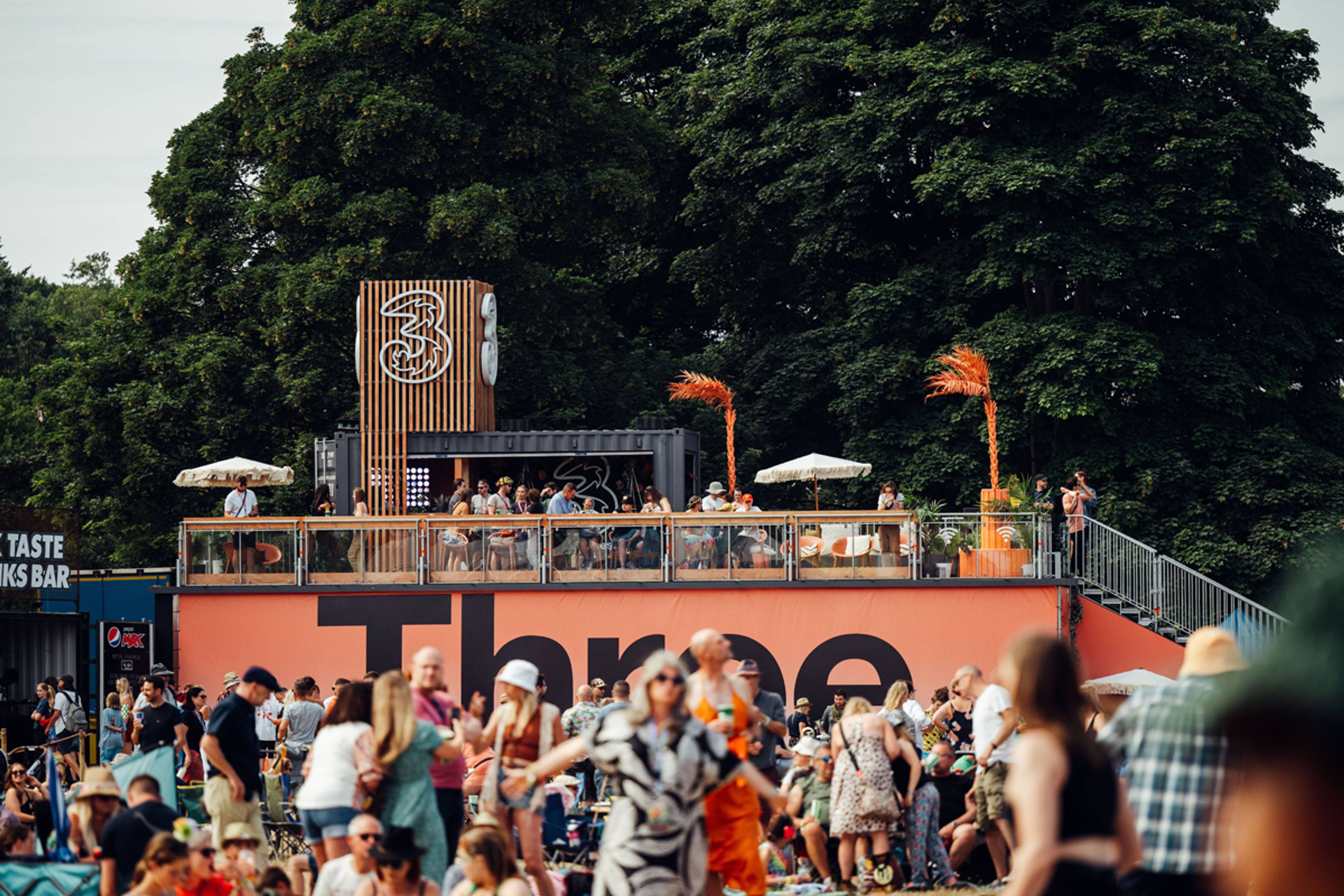 Three's elevated viewing platform at a festival