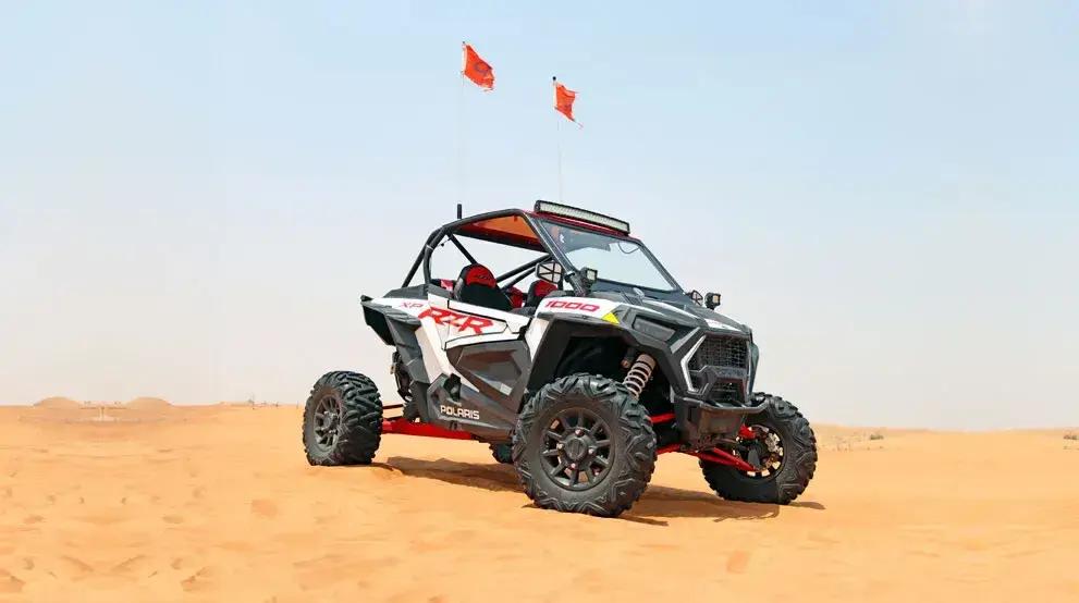 Friends enjoying a desert buggy tour in Dubai