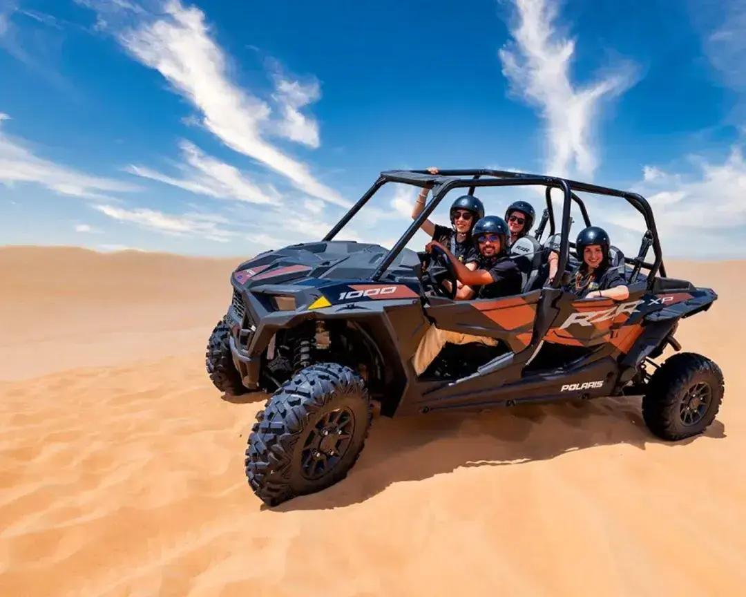 Driver in helmet and goggles ready for a solo buggy ride