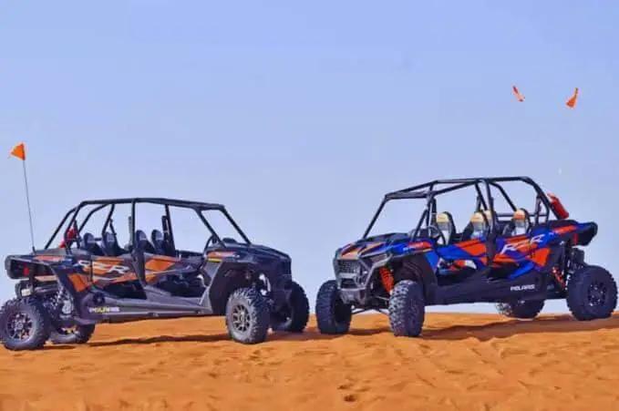 4-seater Polaris buggy cruising across the Dubai desert