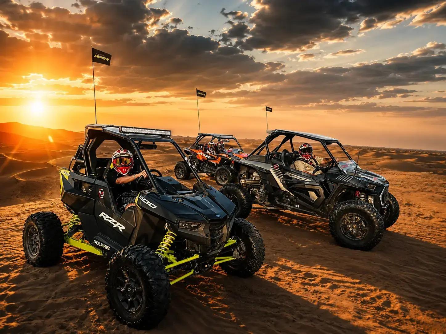 Polaris buggy turning on the dunes with sand flying