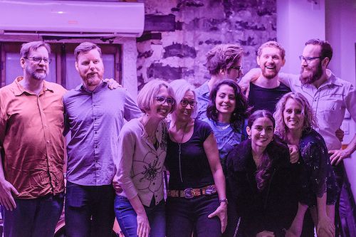 The Femmes Pour Logifem team all on the stage