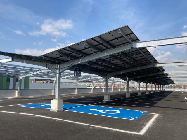 Solar-panel carport installation covering a large parking area
