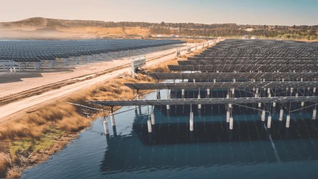 Solar panel structure over aquaculture fish ponds
