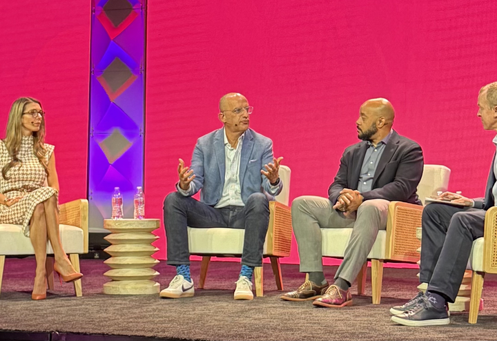 Group of people sitting on a stage