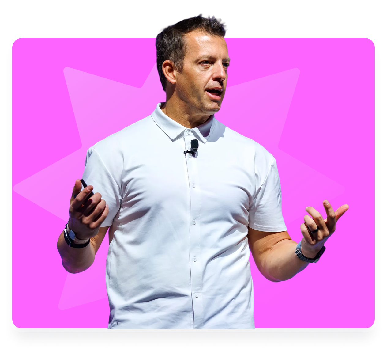 Man standing in front of a pink background