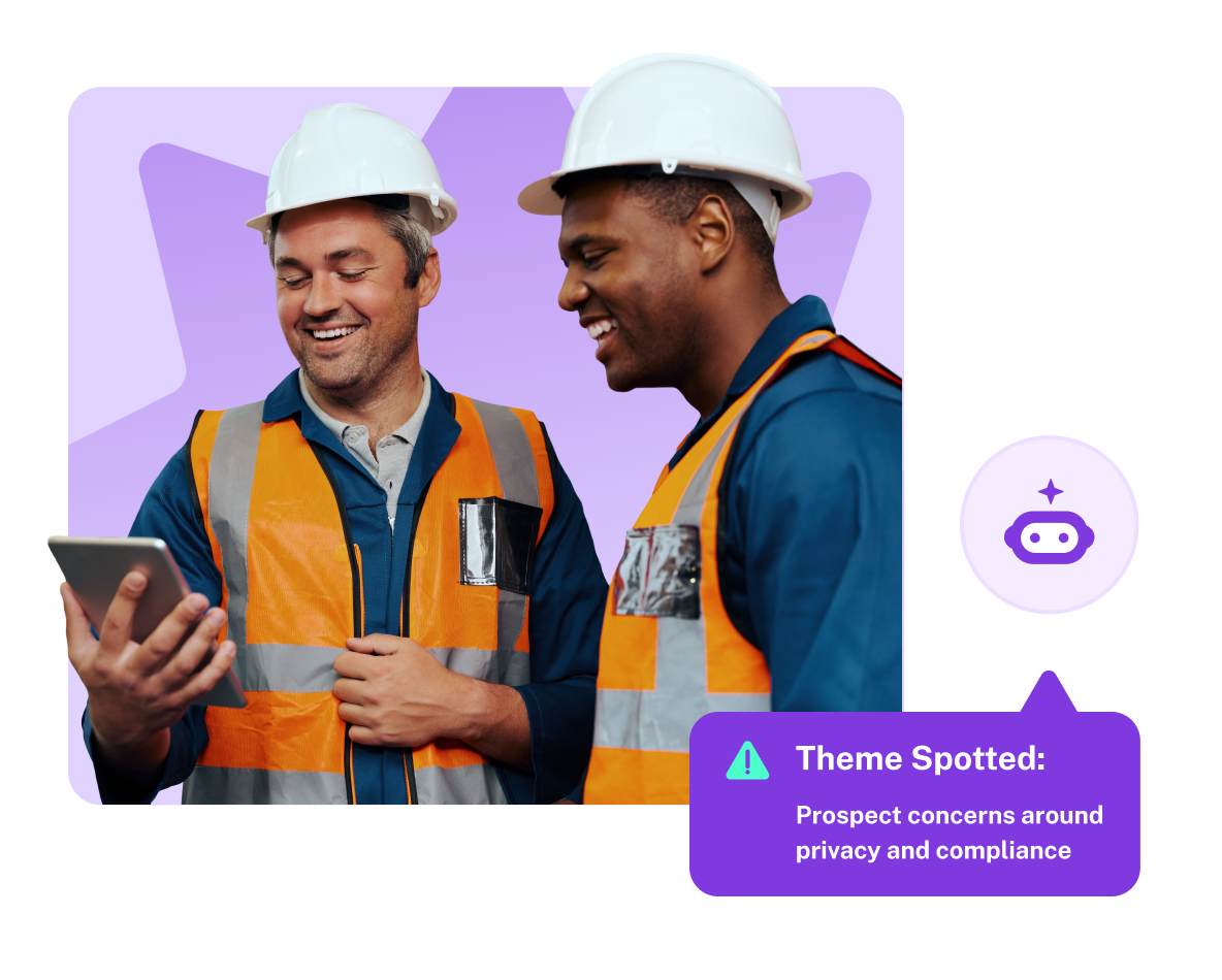 Two men in hardhats looking a tablet with a pop up saying "Theme spotted"