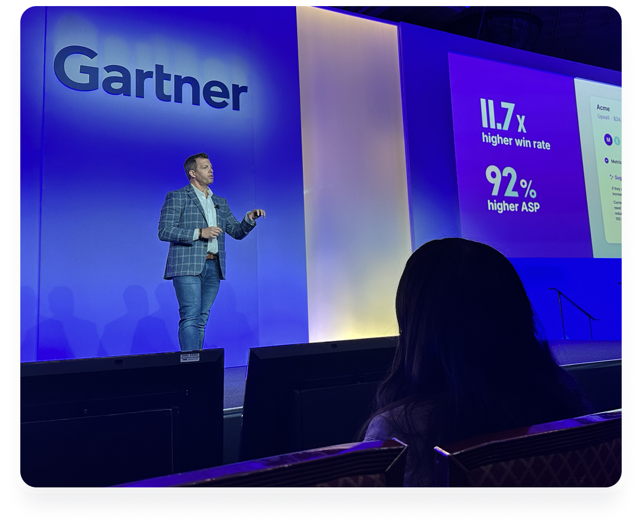 speaker presenting on stage