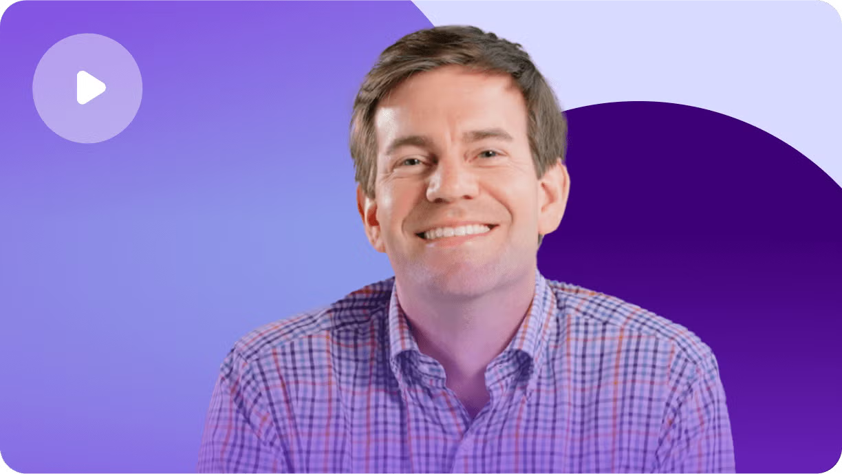 Professional man in purple checkered shirt smiling