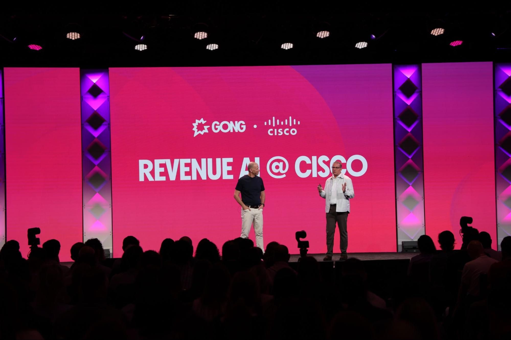 Two men standing on a stage