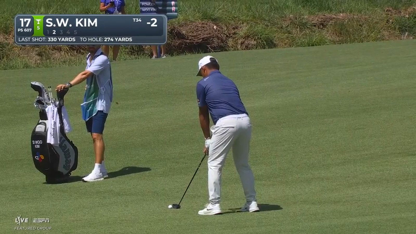 Si Woo Kim tijdens een slag op de PGA Tour in 2026