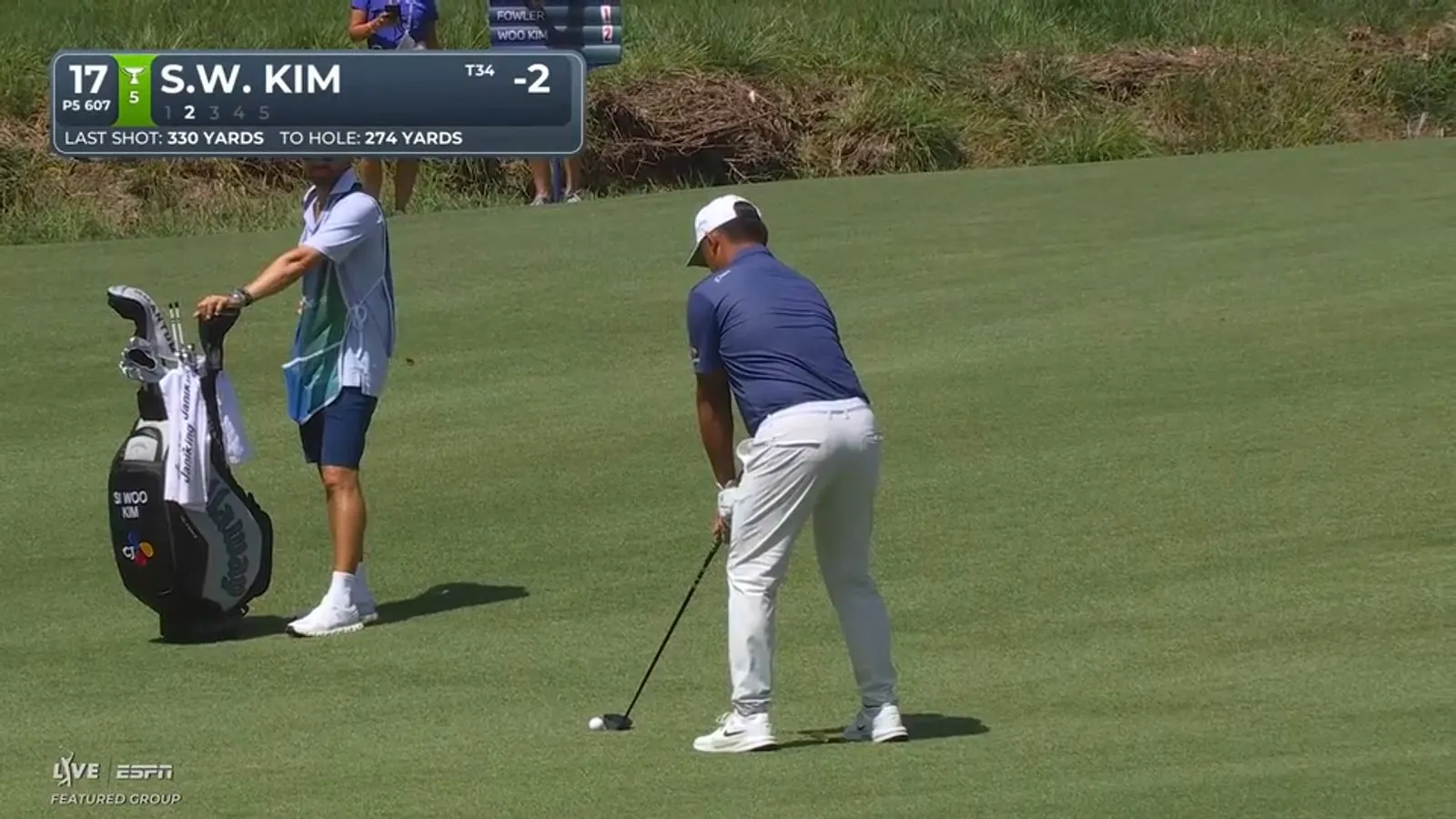 Si Woo Kim tijdens een slag op de PGA Tour in 2026