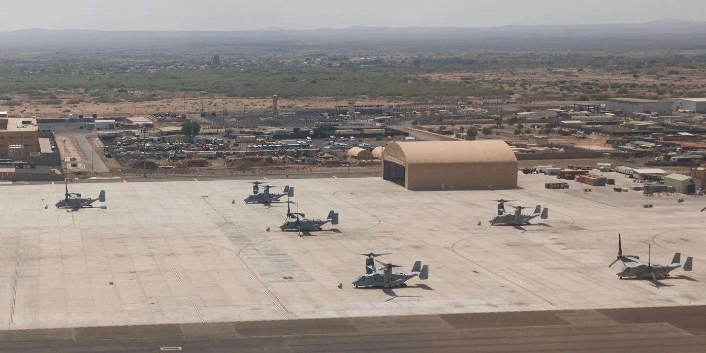 Aerial view of the Camp Lemonnier airfield, with tiltrotor aircraft parked on the apron