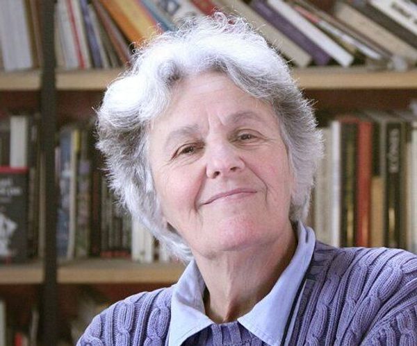 Ariane Mnouchkine leaning in from the side