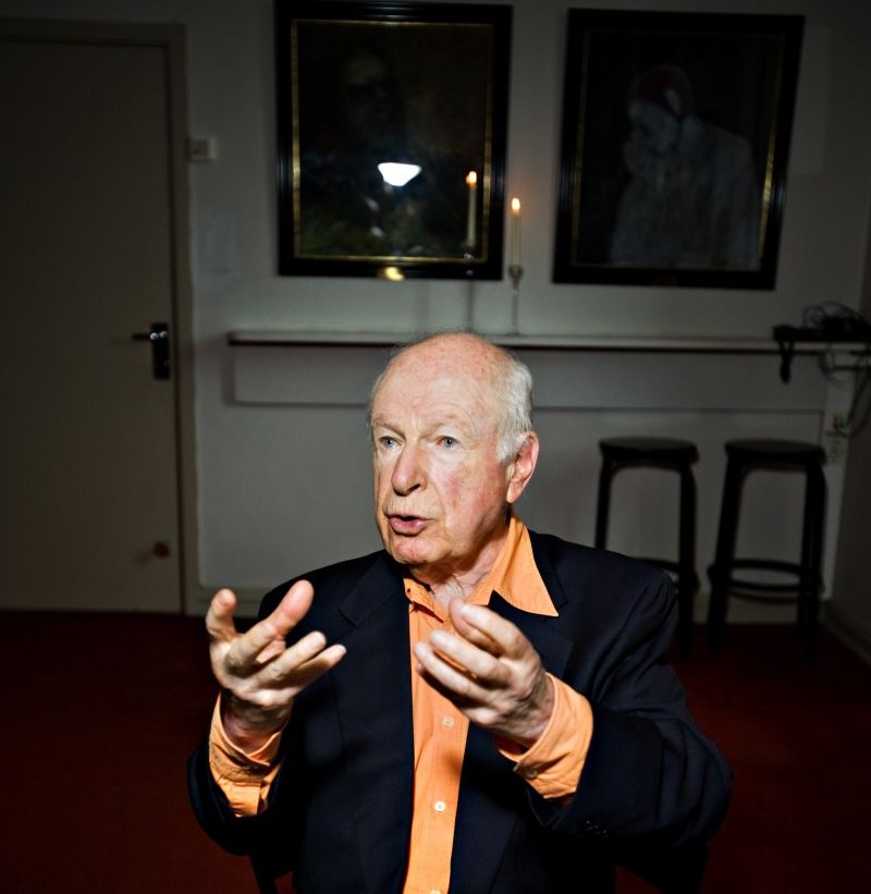 Peter Brook explaining something to someone behind the camera