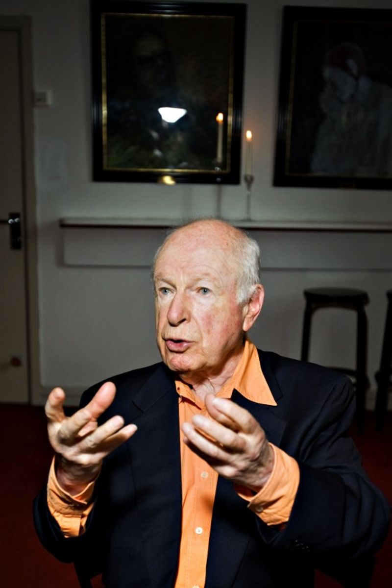 Peter Brook explaining something to someone behind the camera