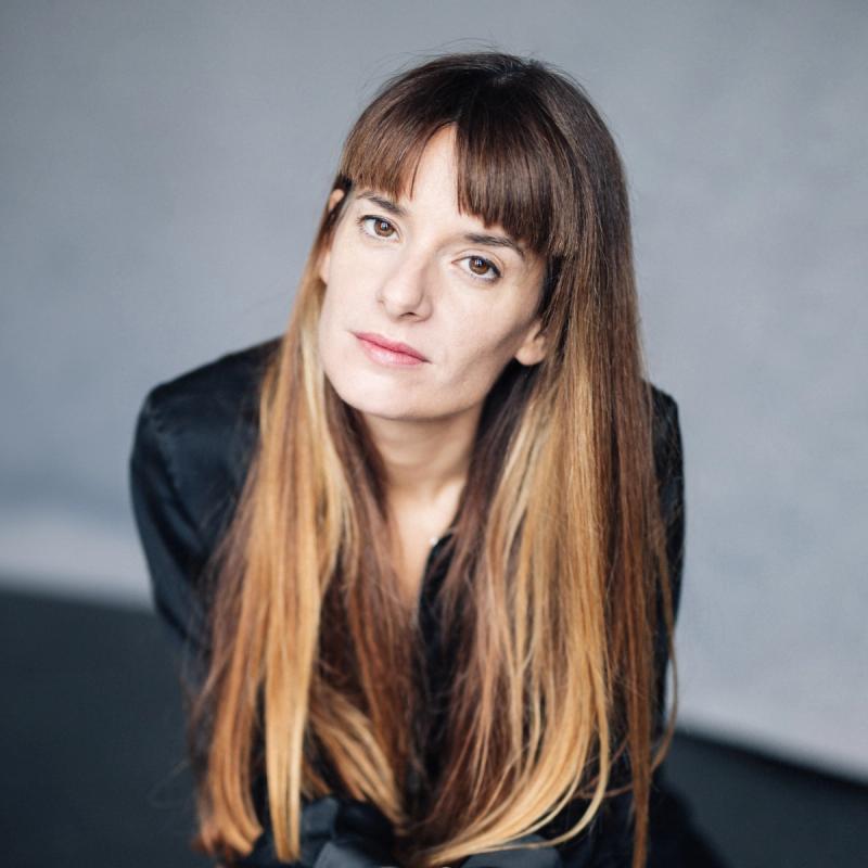 The 2024 winner Lola Arias posing towards the camera