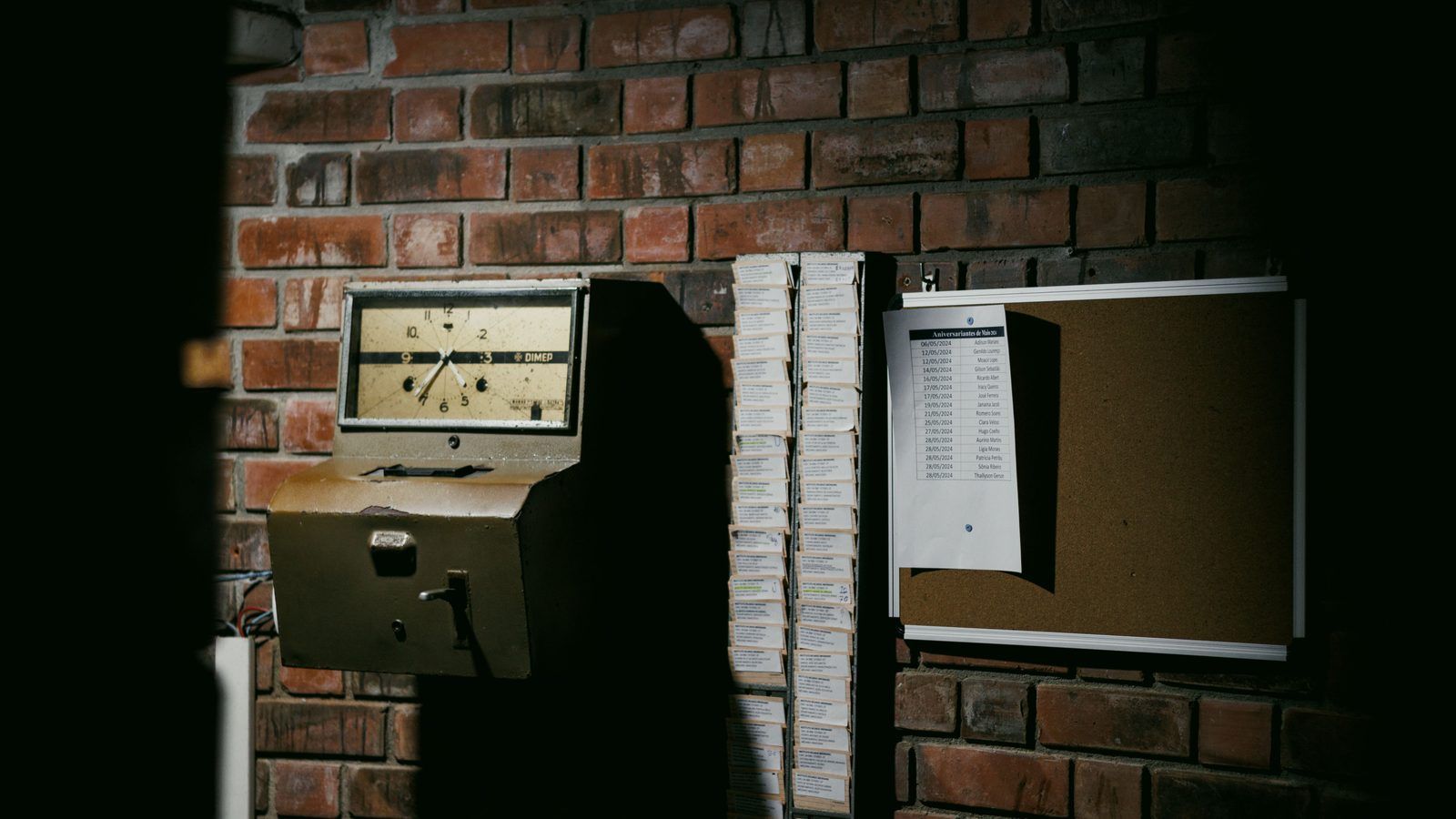 Employees clocking in at a workplace
