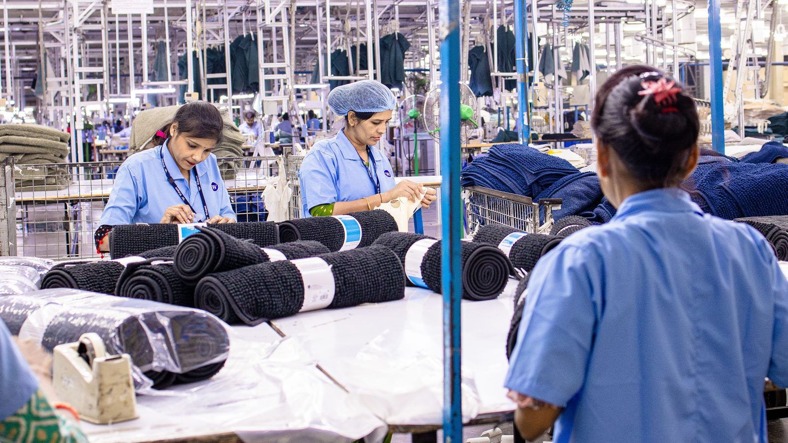 Workers on a manufacturing production floor