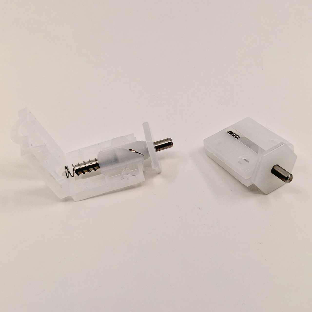 The retractable pin, open and closed