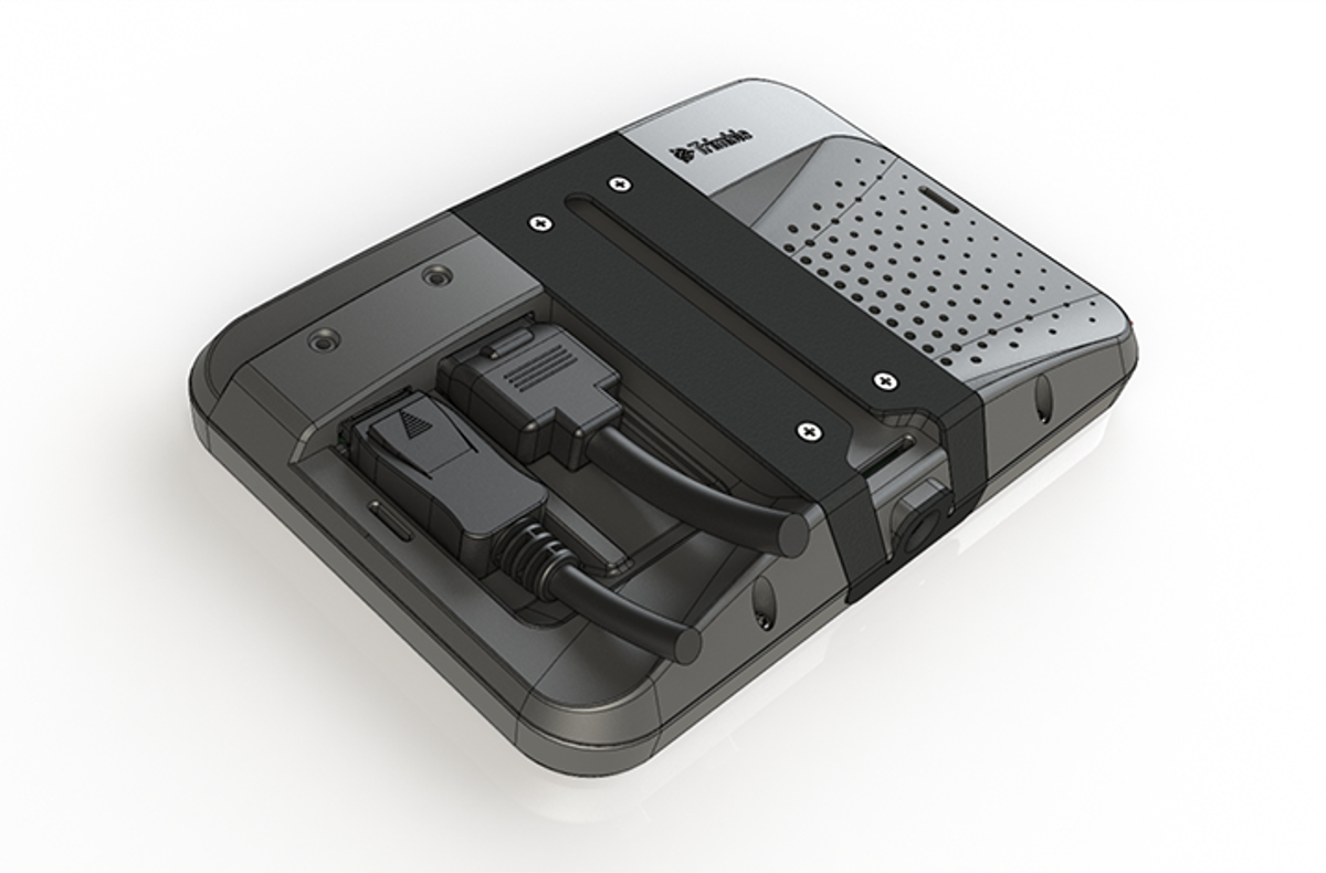 Carcube truck monitor by Trimble Transport & Logistics, featuring slim, compact, user-friendly design, controls rearranged for drivers on both sides, attention to securing external connectors, rear side