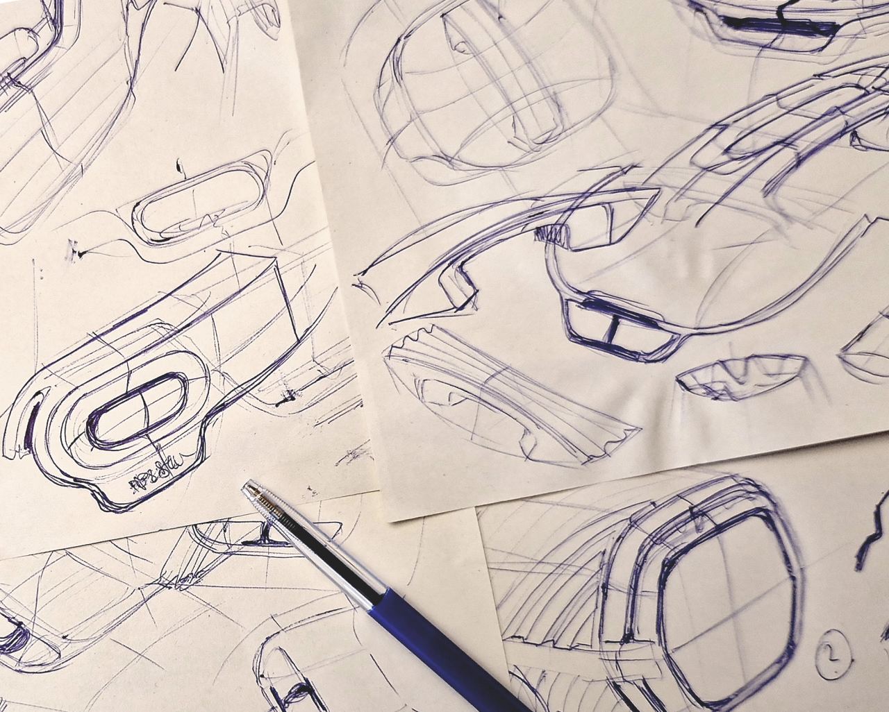 Ballpoint concept sketches of the clips and handle