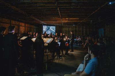 Roots in the Sky Choir performing in Asterisms at Tinworks Art in 2024.