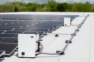 Solar panels and their connectors on a roof