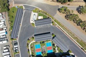 Aerial view of solar panels on the roof of 4 carports
