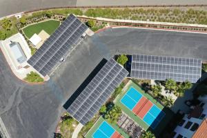 Aerial view of solar panels on the roof of carports