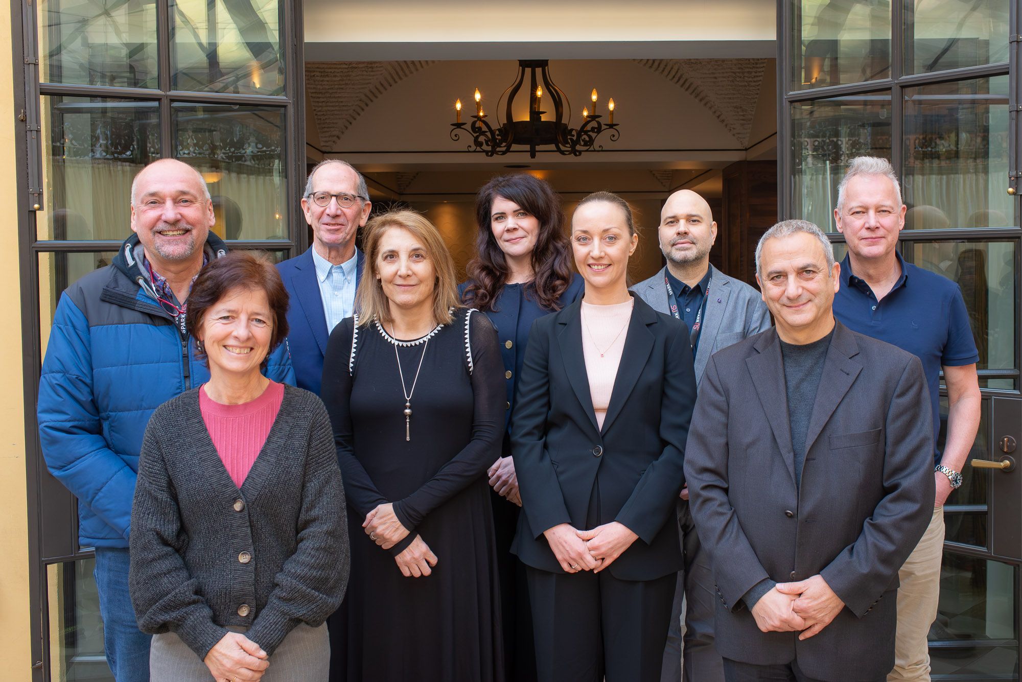 Front row: L to R: Veerle Baekelandt, Pamela England, Špela Miroševič, Antonio Hardan. Back row: L to R Tobias Boeckers, Joseph Buxbaum, Saranna Fanning,  Joseph Mazzulli, and Michael Johnson