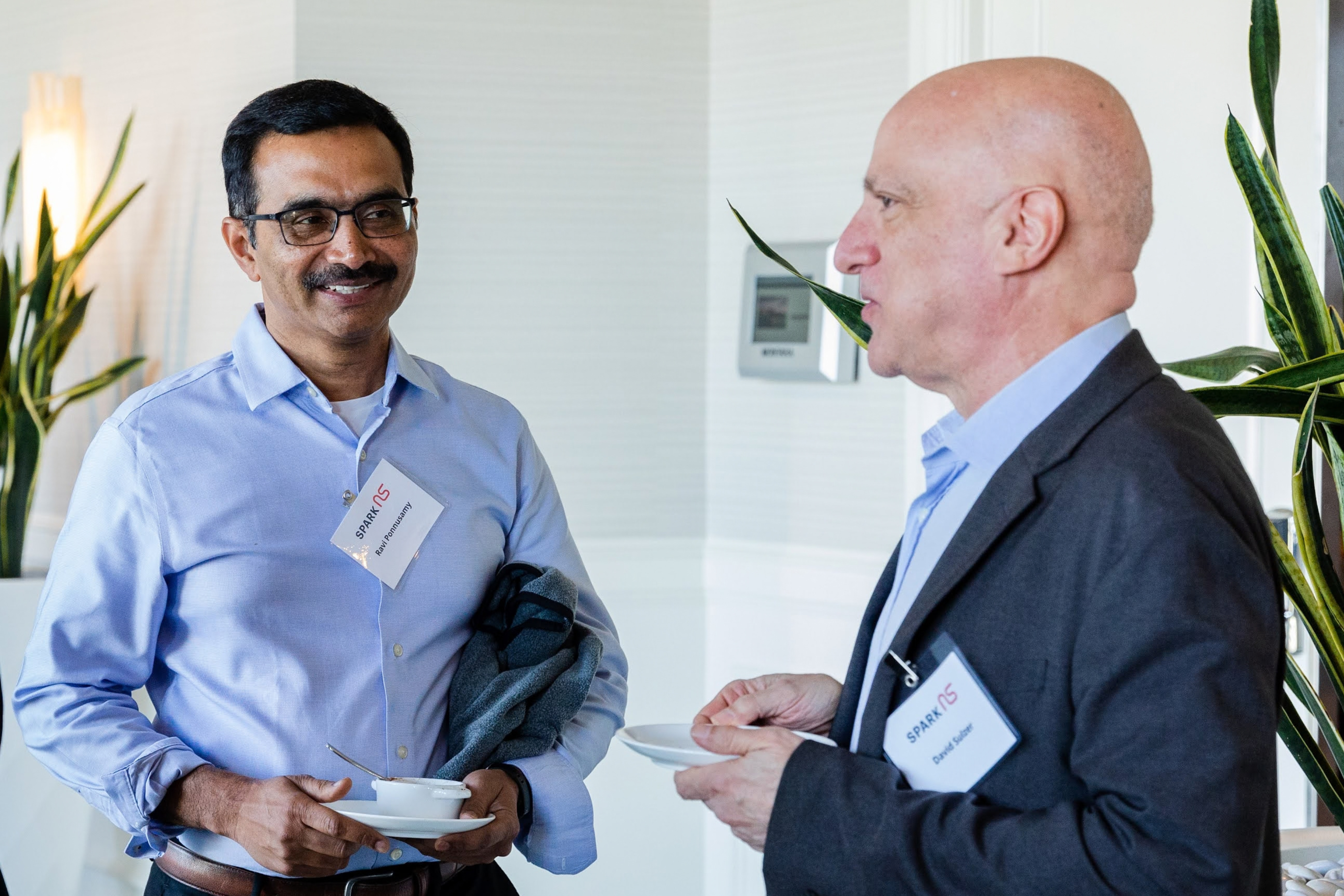 Ravi Ponnusamy, PhD, Senior Project Manager at SPARK NS and David Sulzer, PhD, Professor of Neurobiology at Columbia University talking during a SPARK NS event.