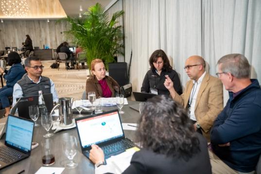 Academic researchers participating in the SPARK NS program and SPARK NS team members in a roundtable discussion.