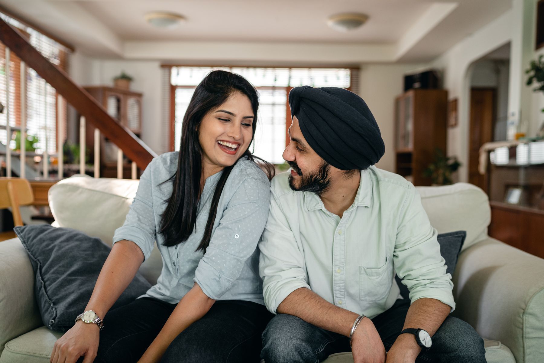 The outcome is deeply personal A couple sharing a relaxed moment at home