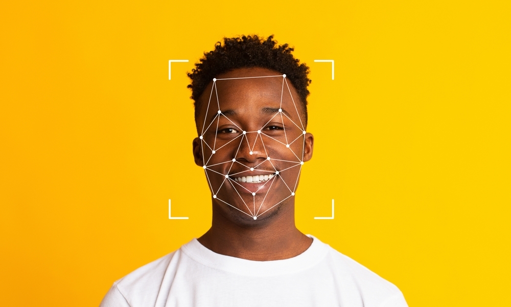 Image Biometric facial age estimation scan on a young man's face for digital identity verification.
