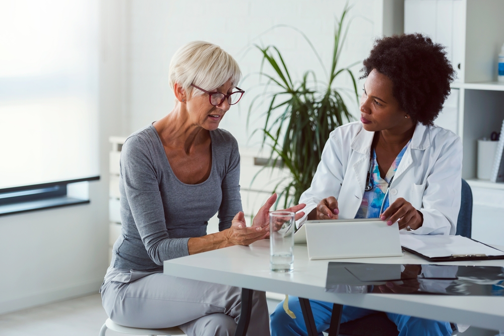 Image Doctor Talking to Patient