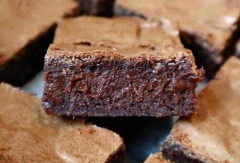 Close-up of fudgy brownie showing soft, moist chocolate center